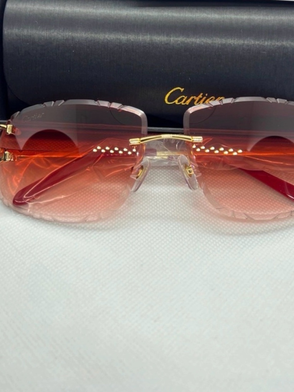 Cartier Rimless Sunglasses with Pink-Red Gradient Lenses and Gold Bridge